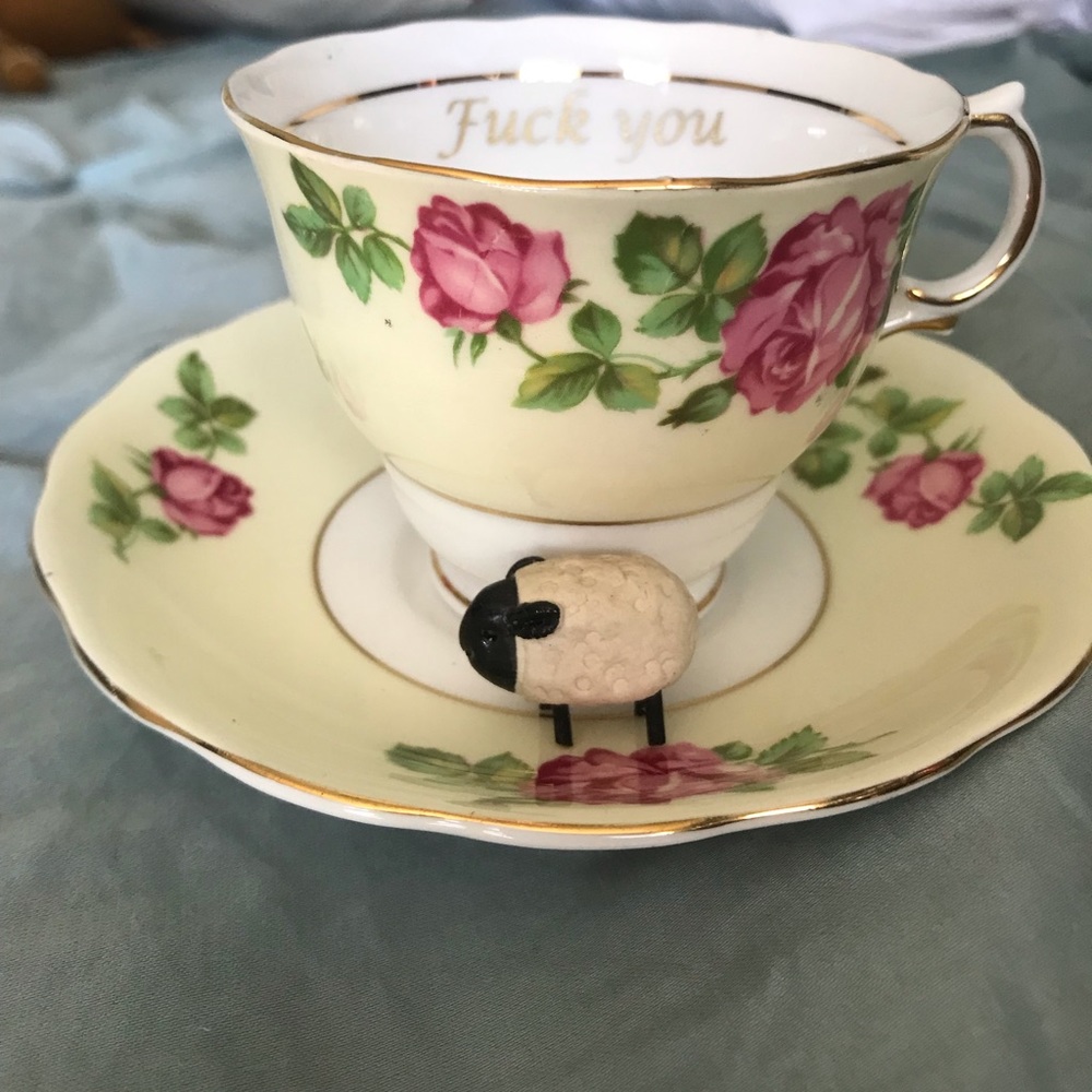 English fine bone China teacup with a vinyl sticker for that extra saucy flare.